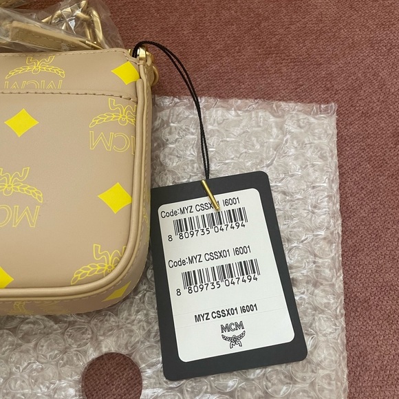 MCM Mini Pouch in Croissant —NWT - Picture 9 of 12